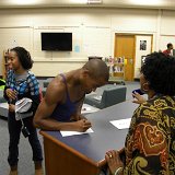 AILEY II dancers Daphne Lee and Edward Spots signing autographs at the reception