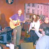 Vicky Luttrell, event organizer, also sang a song she wrote with them.