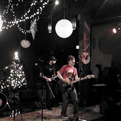 R.J. Soldani (left) joins on lead guitar for &#34;Christmas All Over Again&#34;