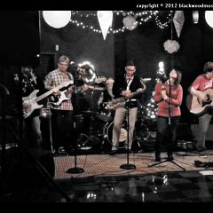 and the band fires up &#34;I Saw Mommy Kissing Santa Claus&#34; ...