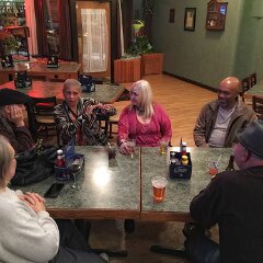 though the band was amazing, we all adjourned next door to visit. (clockwise from lower left) Chris Luttjohann (back to camera, RIP), Randy Wills, Lyn Laws, Roxanne DeGraw, Michael Laws, Marta Barron (partially obscured), and Ric Barron (back to camera, RIP)